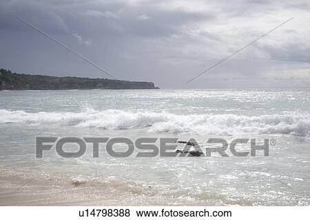 Stock Photo - Seascape along shoreline in Bali. Fotosearch