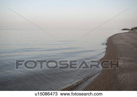Stock Image - Shoreline of Lake Winnipeg in Gimli, Manitoba, Canada. Fotosearch