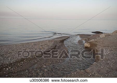 Stock Photograph - Shoreline of Lake Winnipeg in Gimli, Manitoba, Canada. Fotosearch