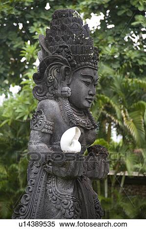 Statue in Bali Indonesia View Large Photo Image Stock Photography - Statue in Bali Indonesia. Fotosearch