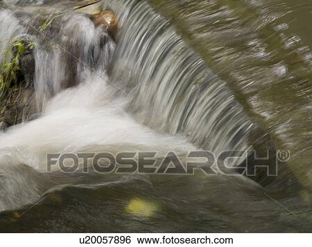 Stock Photograph - Stream of water in Bali. Fotosearch