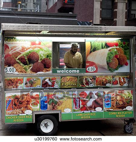 Stock Image - Street vendor in Manhattan, New York City, U. S. A.. Fotosearch