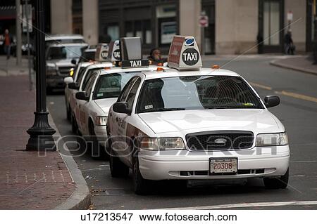 Stock Photo - Taxi cabs on a street in Boston, Massachusetts, USA. Fotosearch