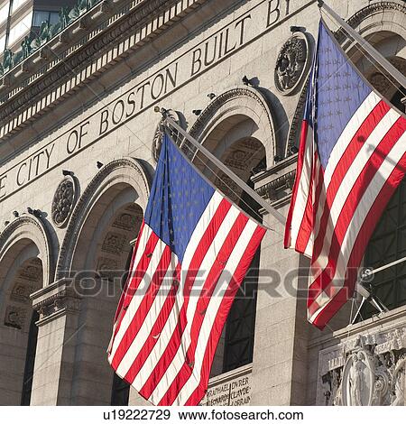 The American Flag on the exterior of a building in Boston, Massachusetts, USA View Large Photo Image Stock Photo - The American Flag on the exterior of a building in Boston, Massachusetts, USA. Fotosearch