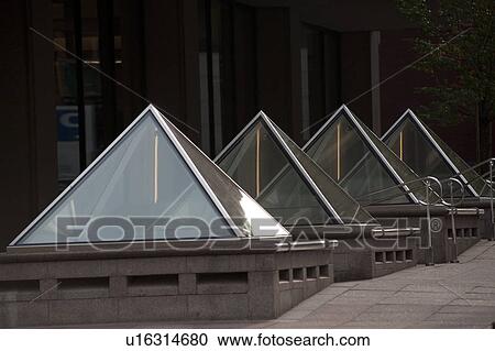 Triangle shaped windows on a building in Boston, Massachusetts, USA View Large Photo Image Stock Image - Triangle shaped windows on a building in Boston, Massachusetts, USA. Fotosearch