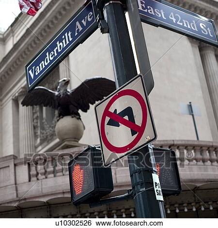 Stock Photograph - Vanderbilt and East 42nd Street signs in Manhattan, New York City, U. S. A.. Fotosearch