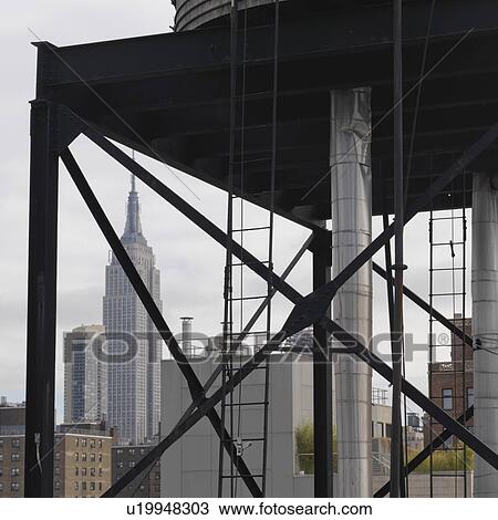 View of the Empire State Building from Chelsea district in Manhattan, New York City, U. S. A. View Large Photo Image Stock Image - View of the Empire State Building from Chelsea district in Manhattan, New York City, U. S. A.. Fotosearch