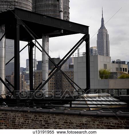 View of the Empire State Building from Chelsea district in Manhattan, New York City, U. S. A. View Large Photo Image Stock Photography - View of the Empire State Building from Chelsea district in Manhattan, New York City, U. S. A.. Fotosearch