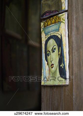 Wall plaque of Asian woman in Bali View Large Photo Image Stock Photo - Wall plaque of Asian woman in Bali. Fotosearch