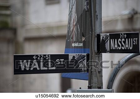 Stock Image - Wall Street sign in Manhattan, New York City, U. S. A.. Fotosearch