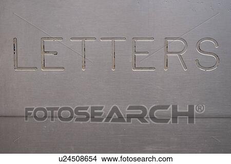 Picture - Wording on letter box in Winnipeg Beach, Manitoba, Canada. Fotosearch