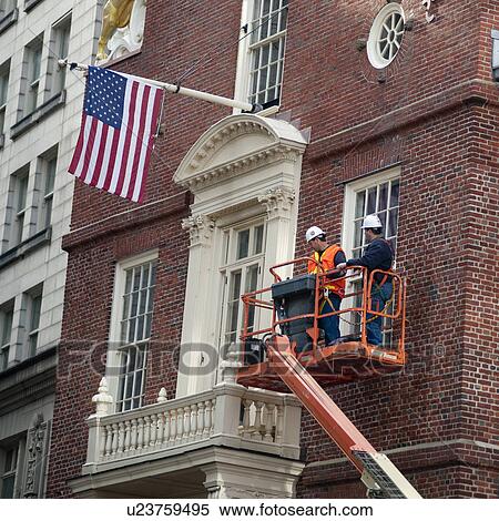 Stock Photography - Workmen at the Old State House in Boston, Massachusetts, USA. Fotosearch