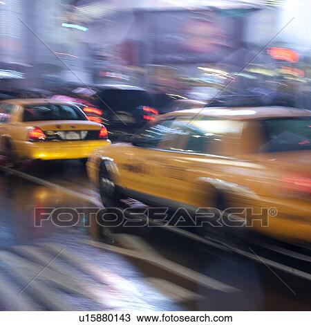 Yellow Taxis on streets in Manhattan, New York City, U. S. A. View Large Photo Image Stock Image - Yellow Taxis on streets in Manhattan, New York City, U. S. A.. Fotosearch