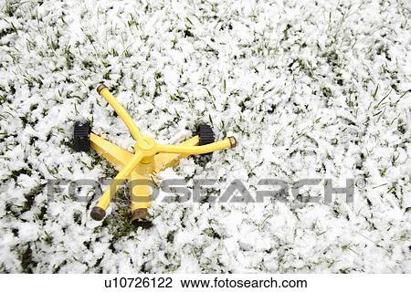 lawn sprinkler on the grass in the snow; edmonton, alberta, canada View Large Photo Image Stock Image - lawn sprinkler on the grass in the snow; edmonton, alberta, canada. Fotosearch