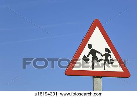 Stock Image - torremolinos, malaga, andalusia, spain; traffic sign warning of nearby school. Fotosearch