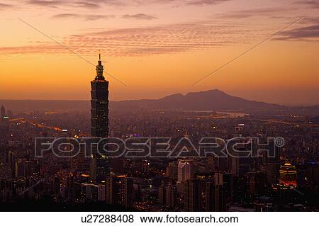 Stock Photo - A beautiful overview to Taipei city with the view to the tallest skyscraper Taipei 101. Fotosearch