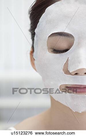 Beauty Treatment, Close-up of woman's half face with facial mask View Large Photo Image Stock Photograph - Beauty Treatment, Close-up of woman's half face with facial mask. Fotosearch