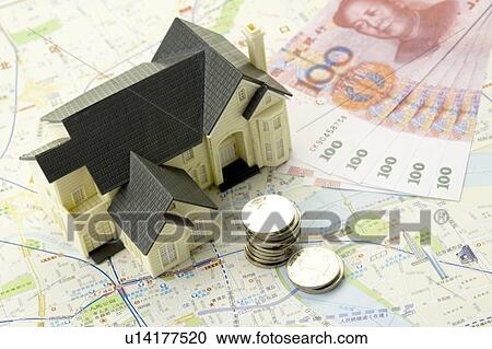 Chinese Currency and a model house on a map View Large Photo Image Stock Image - Chinese Currency and a model house on a map. Fotosearch