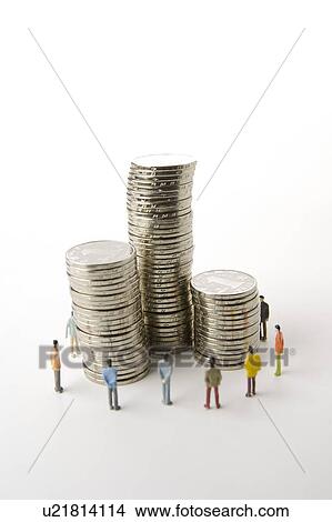 Chinese Currency, five figurine men standing before stacks of coins View Large Photo Image Picture - Chinese Currency, five figurine men standing before stacks of coins. Fotosearch