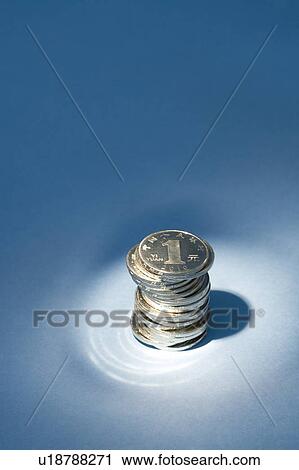 Chinese Currency, stack of coins under spotlight View Large Photo Image Stock Image - Chinese Currency, stack of coins under spotlight. Fotosearch