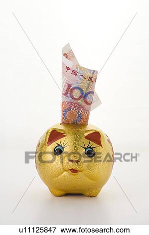 Chinese Currency stuck to a piggy bank View Large Photo Image Stock Photo - Chinese Currency stuck to a piggy bank. Fotosearch