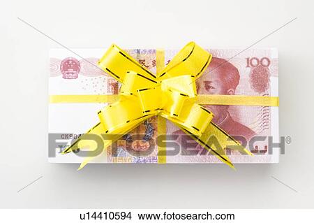 Chinese Currency tied with ribbon View Large Photo Image Picture - Chinese Currency tied with ribbon. Fotosearch