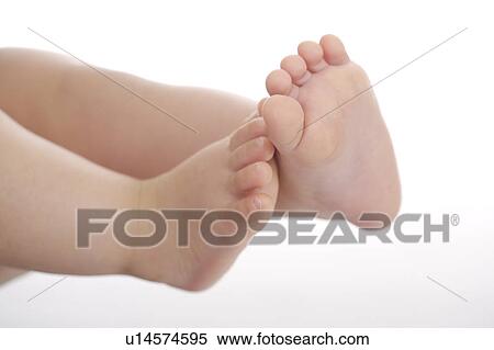 Close-up of baby boy's feet View Large Photo Image Stock Photography - Close-up of baby boy's feet. Fotosearch