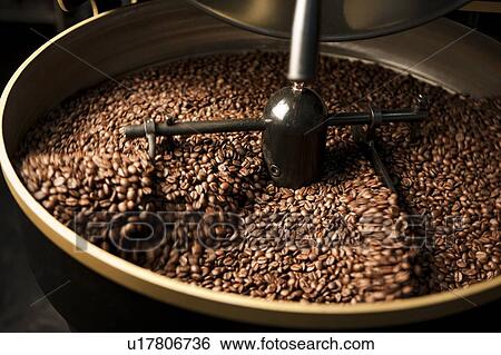 Close-up of coffee beans on the roasting machine View Large Photo Image Stock Photograph - Close-up of coffee beans on the roasting machine. Fotosearch