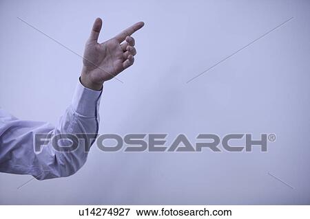 Close-up of man's hand gesturing View Large Photo Image Stock Photo - Close-up of man's hand gesturing. Fotosearch