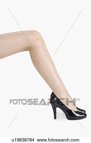 Close-up of young woman's leg with high heels View Large Photo Image Picture - Close-up of young woman's leg with high heels. Fotosearch