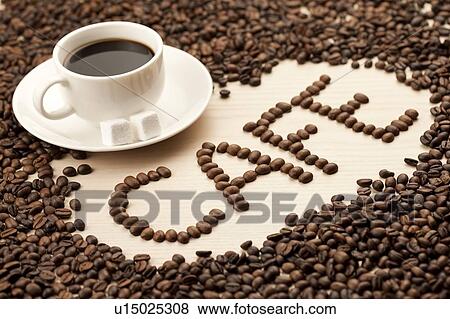 Coffee Bean, Close-up of a cup of coffee and a stack of coffee beans View Large Photo Image Stock Photo - Coffee Bean, Close-up of a cup of coffee and a stack of coffee beans. Fotosearch