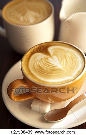 Stock Photo - Coffee, Close-up of a cup of cappuccino with pattern. Fotosearch