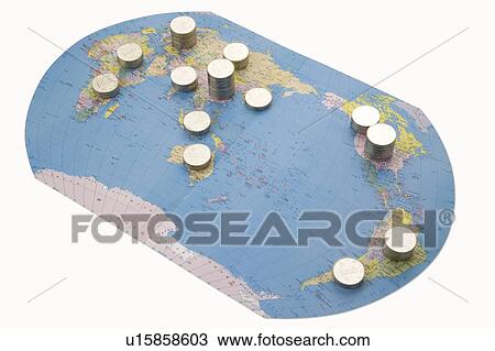 Stock Image - Coins on a World Map. Fotosearch