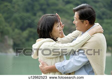 Couple, Couple bonding together and looking at each other with love View Large Photo Image Stock Image - Couple, Couple bonding together and looking at each other with love. Fotosearch