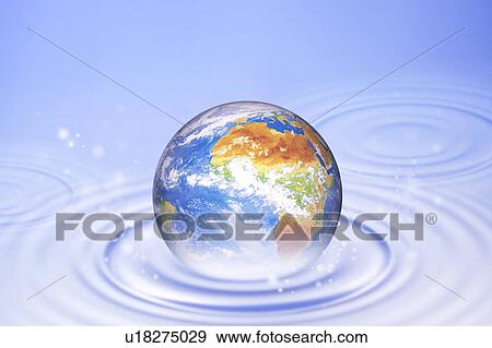 Stock Photo - Environmental Conservation, Digitally generated image of the earth on the rippled water. Fotosearch