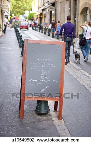 Stock Image - France, Aix-en-Provence, Blackboard, City Street. Fotosearch