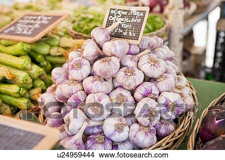 Picture - Garlic in the market of Nice, France. Fotosearch