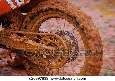 Stock Photo - Motocross over field.. Fotosearch