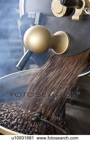 Stock Image - Roasted, Close-up of roasting machine of coffee beans. Fotosearch