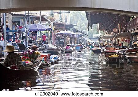 Stock Image - Thailand, Bangkok, Floating Market. Fotosearch