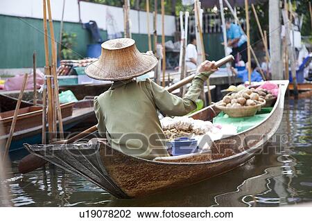 Stock Image - Thailand, Bangkok, Floating Market. Fotosearch
