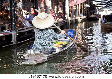 Stock Image - Thailand, Bangkok, Floating Market. Fotosearch