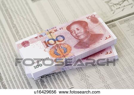 Stock Photograph - Two stacks of Chinese Currency. Fotosearch