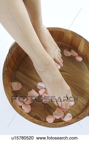 Young woman making spa treatment for barefoot View Large Photo Image Stock Image - Young woman making spa treatment for barefoot. Fotosearch