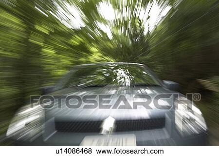 A Car Running in Green Forest View Large Photo Image Stock Photo - A Car Running in Green Forest. Fotosearch