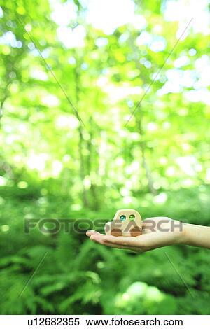A toy car on hand View Large Photo Image Stock Photography - A toy car on hand. Fotosearch