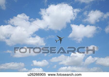 Stock Photography - Airplane in the sky. Fotosearch