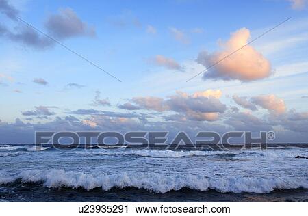 Stock Image - Beach at dusk. Fotosearch