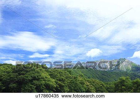 Stock Photography - Blue sky over Daisen. Fotosearch