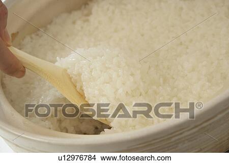 Boiled rice in crock pot, close up View Large Photo Image Picture - Boiled rice in crock pot, close up. Fotosearch